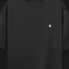 premium black oversized t-shirt for men with embroidered shield logo front view